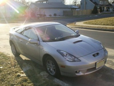 Vrooom. George travels in style. (Yes, this is actually my car.)